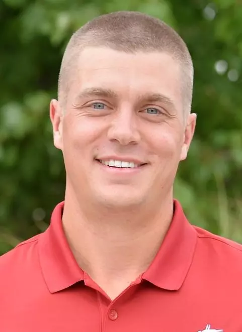 Assistant men's golf coach Chris Gilbert