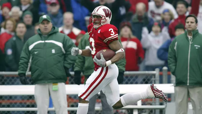 University of Wisconsin wide receiver Lee Evans (3) scores his second touchdown pass reception during the 2nd quarter of the Michigan State game at Camp Randall Stadium. Evans finished the day with 5 touchdowns and 258 yards receiving. Wisconsin beat Michigan State 56-21. ©David Stluka