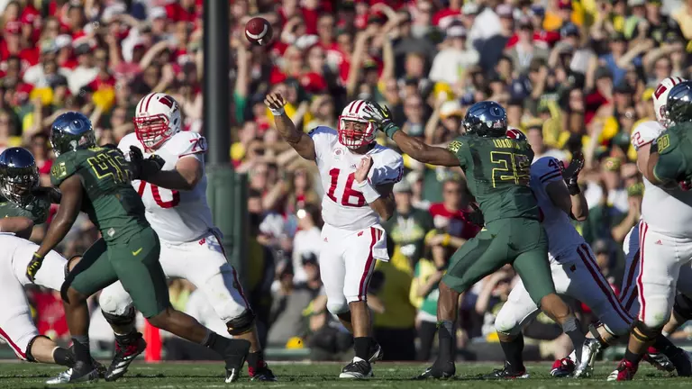 Wisconsin Badgers quarterback Russell Wilson (16) throws a pass during the 2012 Rose Bowl NCAA football game in Pasadena, California on January 2, 2012. The Ducks won 45-38. (Photo by David Stluka)