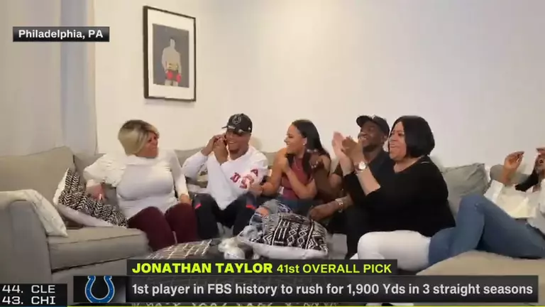 screenshot of ABC broadcast of Jonathan Taylor and family during NFL draft