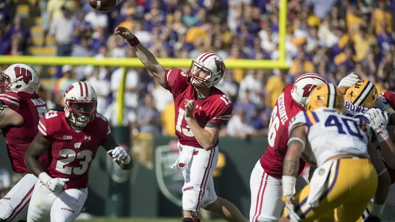 Wisconsin Badgers quarterback Bart Houston (13) throws the ball during an NCAA college football game against the LSU Tigers Saturday, September 3, 2016, in Green Bay, Wis. The Badgers beat the Tigers 16-14. (Photo by David Stluka)