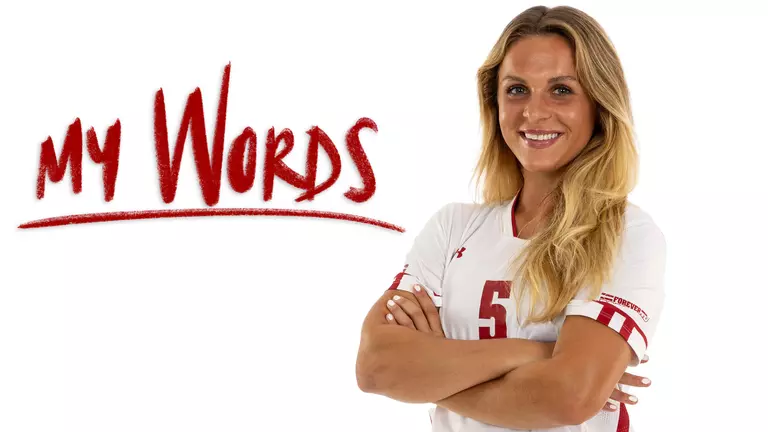 Dara Andringa, Wisconsin Women's Soccer, headline image of Dara smiling with arms crossed looking at camera and "My Words" script logo in red