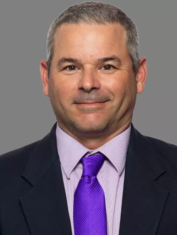 Luc Godin men's tennis associate head coach