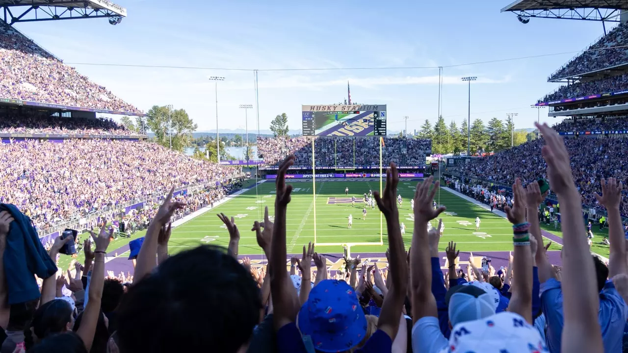 UW football fans cheering