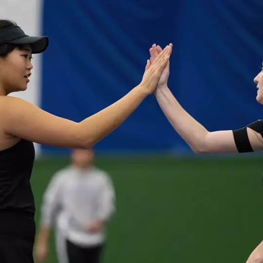 Maggie Song and Savannah Johnson during a match against Utah Tech