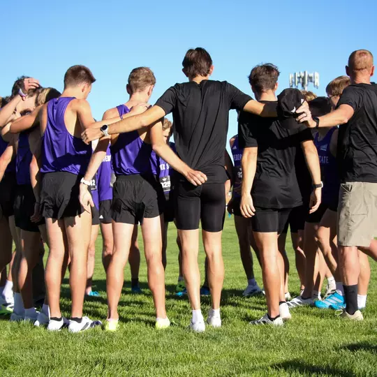 Men's cross country huddle