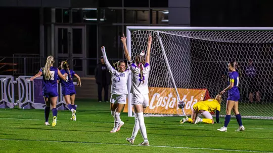 Lily Blum and Simone Packer celebrating
