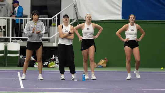 4 Wildcats look on during a match against Idaho