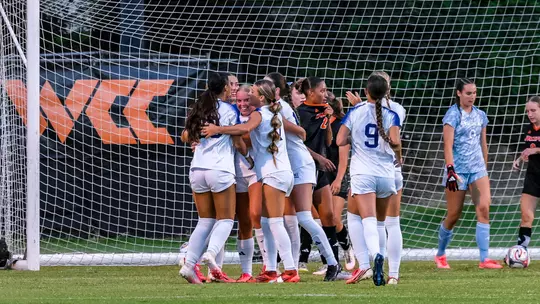Weber State soccer team celebrating a goal