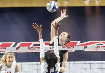 Outside hitter Faith Young (22) | Photo by Nico Pascarella