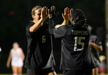 Midfielder April McDonald (6) and Forward Danielle Lewin (15) | Photo by Steve Roberts