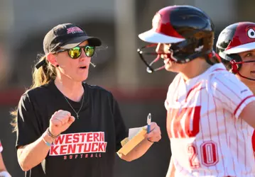 Head coach Amy Tudor and Infielder Charlotte Herron (20) | Photo by Steve Roberts