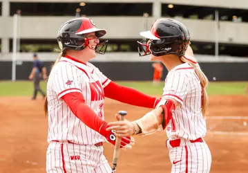 WKU Hilltoppers infielder Maci Masters (30), WKU Hilltoppers outfielder Kendle White (21) | Photo by Savannah Philpot