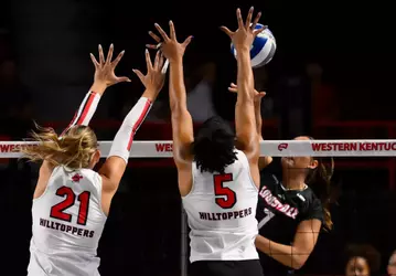 Outside hitter Eliza McNight (21) and Defensive specialist Kaira Knox (5) | Photo by Steve Roberts