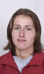 Cougar Tennis Edged by Huskies