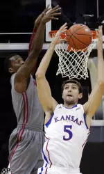 Cougars Overpowered by No. 12 Kansas, 78-41