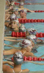 Cougars Conquer Vandals In 135-70 Dual Meet Victory