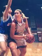 Cougars Tame Bulldogs 74-56