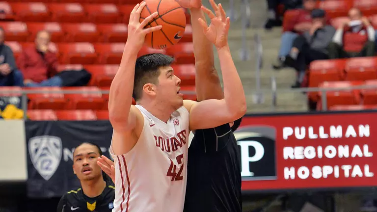 Clifford Leads Cougars Past Golden Eagles