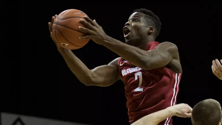 Cougar Men Edged At Idaho