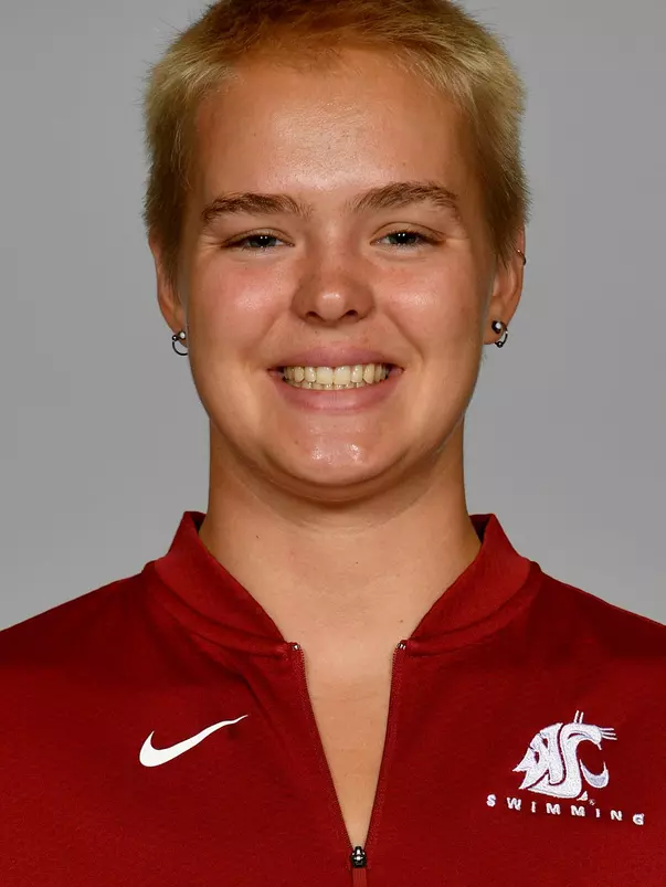 Members of the Washington State swimming pose for website roster pictures during poster photo day, Friday, Aug. 30, 2019 at Gibb Pool in Pullman, Wash.