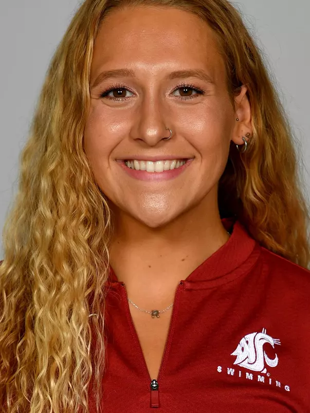Members of the Washington State swimming pose for website roster pictures during poster photo day, Friday, Aug. 30, 2019 at Gibb Pool in Pullman, Wash.