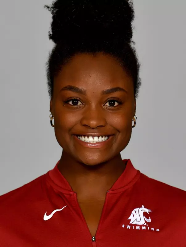 Members of the Washington State swimming pose for website roster pictures during poster photo day, Friday, Aug. 30, 2019 at Gibb Pool in Pullman, Wash.
