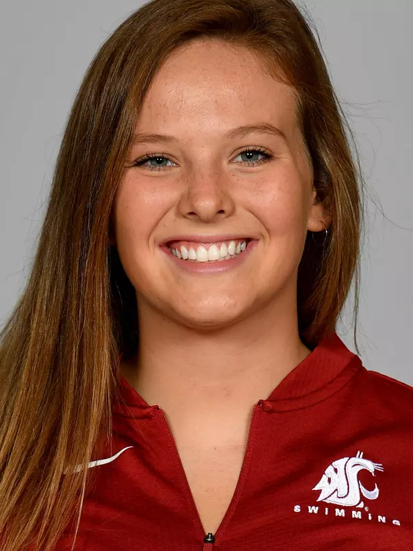 Members of the Washington State swimming pose for website roster pictures during poster photo day, Friday, Aug. 30, 2019 at Gibb Pool in Pullman, Wash.