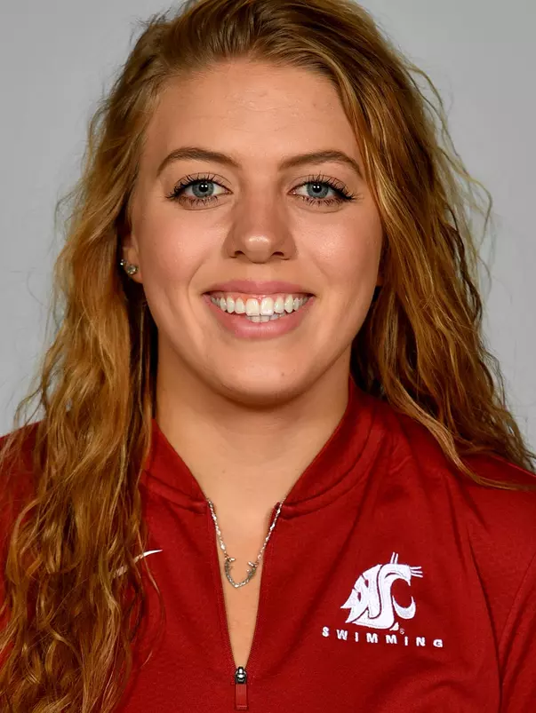 Members of the Washington State swimming pose for website roster pictures during poster photo day, Friday, Aug. 30, 2019 at Gibb Pool in Pullman, Wash.