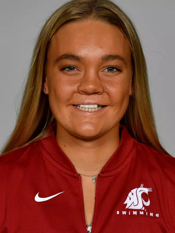 Members of the Washington State swimming pose for website roster pictures during poster photo day, Friday, Aug. 30, 2019 at Gibb Pool in Pullman, Wash.
