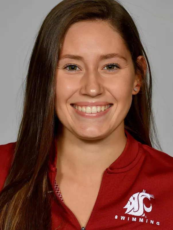 Members of the Washington State swimming pose for website roster pictures during poster photo day, Friday, Aug. 30, 2019 at Gibb Pool in Pullman, Wash.