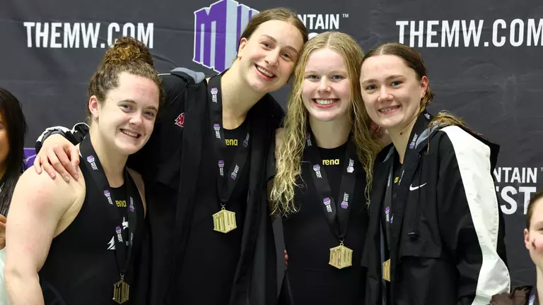 Cougars Win 200 Free Relay, Sit in Third Place after Day 2
