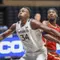 Oscar Tshiebwe blocks out for the rebound.