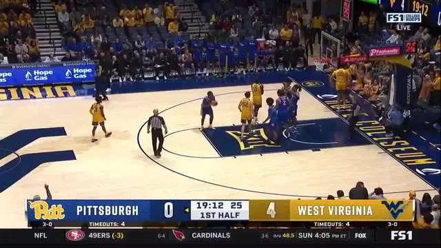 Jasper Floyd with the Basket Plus the Foul