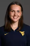A headshot of WVU Volleyball coach Eleanor Beavin