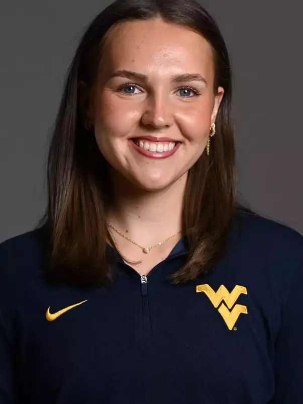 A headshot of WVU Volleyball coach Eleanor Beavin