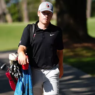 Ryan Sam walks to a tee box for YSU during the 2026 Horizon League Men's Golf Championship (Photo by Drae Smith)