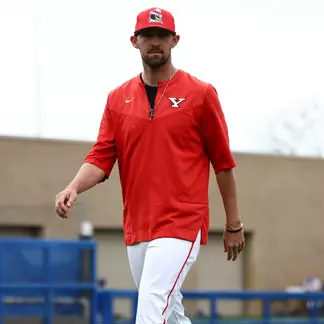 Head Coach Trevor Charpie walks to YSU's dugout during a baseball game at Pitt on March 25, 2026 (Photo by Bryson Chavez)