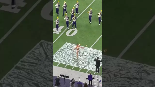 Poster image for Our twirler is unreal!! 🔥 #GoHuskies #twirler #marchingband #college #d1athlete