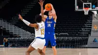 Miles Barnstable shoots against San Jose State