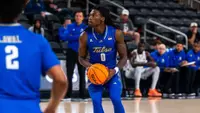 Ade Popoola looks to shoot against San Jose State