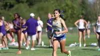 Kathryn Koonts runs at the Gans Creek Classic