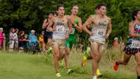 Graham Stevener and Graham Mitchell run at the Cowboy Jamboree