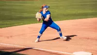 Maci Cole fields a ball at third against Oklahoma State