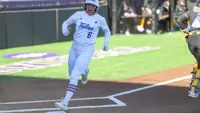 Mackenzy Glenn scores a run against Pitt