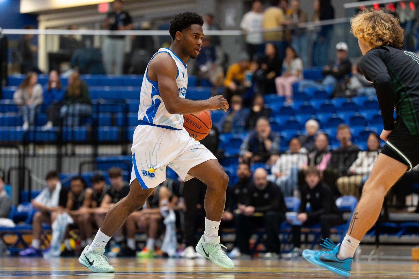 Vikes shoot lights out from deep in high scoring season opener