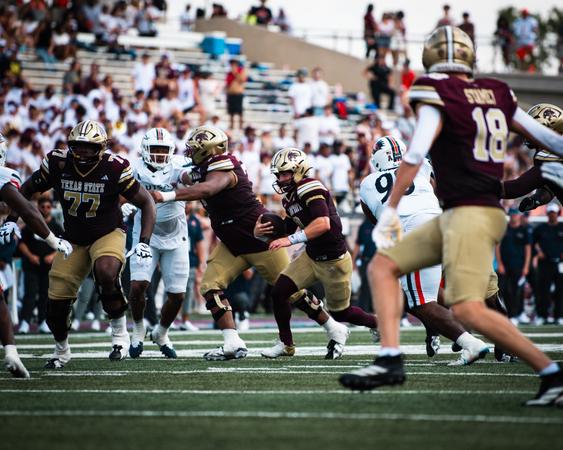 Brad Jackson rushes the ball against UTSA on September 12 at UFCU Stadium