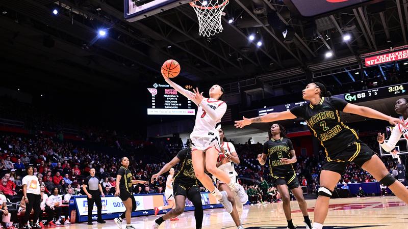 Leung shooting a driving layup