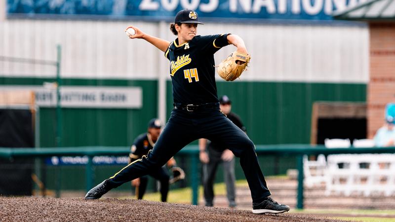 Coach Bham pitching