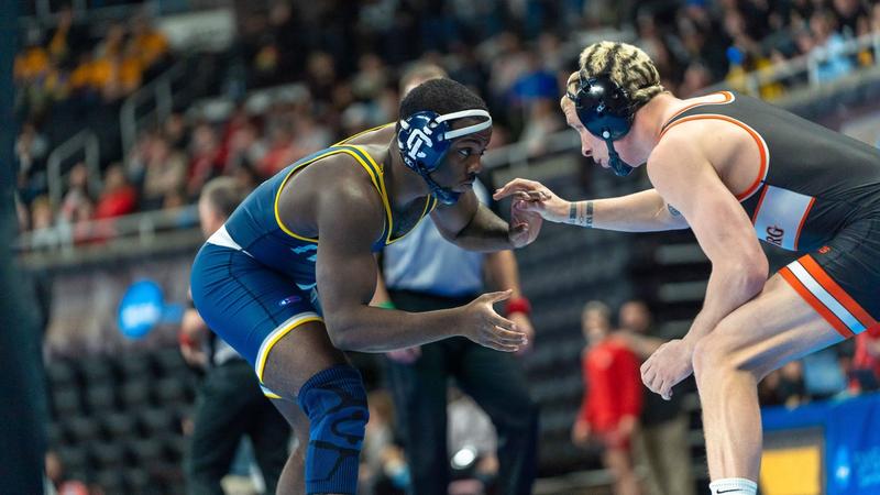 Edroy Pommells Xavier Pommells Earns All-America Honors Highlighting Day One at the ...
